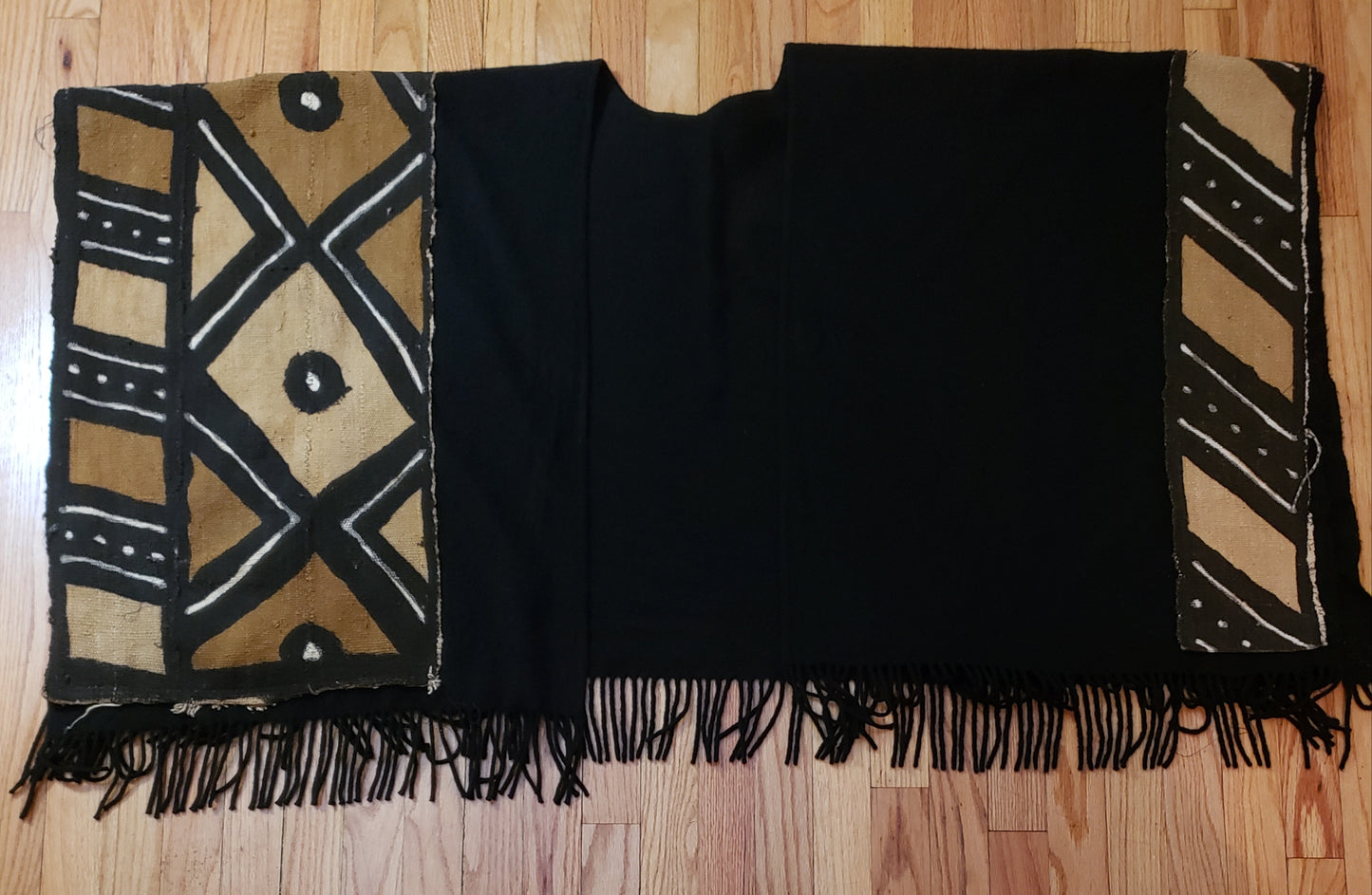 Save 50.00 off this Authentic Mud cloth and Fleece Shawls. Four Color Mud cloth from Mali West Africa